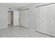 Large bedroom with ample closet space and neutral decor at 811 N Keene Rd # V7, Clearwater, FL 33755