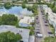 Aerial view of condo complex near lake with parking at 811 N Keene Rd # V7, Clearwater, FL 33755