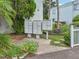 Three mailboxes in a landscaped area at 811 N Keene Rd # V7, Clearwater, FL 33755