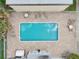 Overhead view of a community pool and surrounding patio area at 811 N Keene Rd # V7, Clearwater, FL 33755