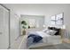 Spacious bedroom with a king-size bed and plenty of closet space at 811 N Keene Rd # V7, Clearwater, FL 33755