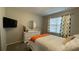 Bedroom with a full-size bed and dresser at 7224 Ketch Pl, Bradenton, FL 34212