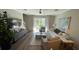 Comfortable living room featuring hardwood floors and lots of natural light at 7224 Ketch Pl, Bradenton, FL 34212