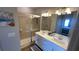 Elegant bathroom with double vanity and large shower at 7224 Ketch Pl, Bradenton, FL 34212