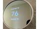 Smart thermostat displaying indoor temperature of 70 degrees at 7224 Ketch Pl, Bradenton, FL 34212