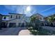 Attractive townhome with two-car garage and lush landscaping at 7224 Ketch Pl, Bradenton, FL 34212