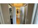 Clean bathroom with double sinks and walk-in closet at 7224 Ketch Pl, Bradenton, FL 34212