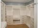 Spacious walk-in closet with custom shelving, drawers, and ample storage at 236 20Th Ave Se, St Petersburg, FL 33705