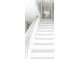 Bright staircase with white steps and gray trim leading to an upper level with a chandelier at 236 20Th Ave Se, St Petersburg, FL 33705