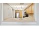 Kitchen with light countertops, sink, and wood cabinets. Appliances include a stainless steel refrigerator at 6219 Palma Del Mar S Blvd # 301, St Petersburg, FL 33715