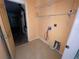 Laundry room with washer and dryer hookups and shelving at 4495 Amari Rd, North Port, FL 34291