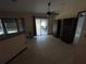 Living area with sliding doors leading to patio at 4495 Amari Rd, North Port, FL 34291