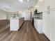 Modern kitchen with white cabinets and granite countertops at 26119 Constantine Rd, Punta Gorda, FL 33983