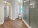 Updated bathroom with walk-in shower and modern vanity at 26119 Constantine Rd, Punta Gorda, FL 33983