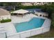 L-shaped pool with patio furniture and gazebo at 3601 57Th Avenue W Dr # 31, Bradenton, FL 34210