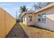 Cozy backyard featuring a privacy fence and lush landscaping, perfect for outdoor enjoyment at 1023 Madison St, Largo, FL 33770