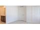 Bright bedroom with ensuite bathroom featuring neutral carpet and closet at 17384 Robinson Ave, Port Charlotte, FL 33948