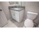 Clean bathroom with granite countertop and white vanity at 2136 Cerulean Sky Way, Lutz, FL 33558