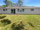 Large backyard with plenty of space for outdoor activities at 1340 Redstart Rd, Venice, FL 34293