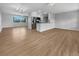 Spacious living area with hardwood floors and open layout at 1340 Redstart Rd, Venice, FL 34293