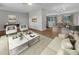 Bright and airy living room with hardwood floors at 1340 Redstart Rd, Venice, FL 34293