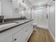 Updated bathroom with double vanity and a large walk-in shower at 1340 Redstart Rd, Venice, FL 34293