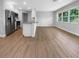 Modern kitchen with island and stainless steel appliances at 1340 Redstart Rd, Venice, FL 34293