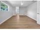 Bright and spacious bedroom with light wood flooring at 1340 Redstart Rd, Venice, FL 34293