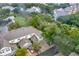 Aerial view of townhouses near a lake at 2111 Tetley Ct, Brandon, FL 33510