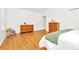 Bedroom with wood floors and two wooden dressers at 2111 Tetley Ct, Brandon, FL 33510