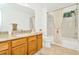 Clean bathroom with granite countertops and a bathtub at 2111 Tetley Ct, Brandon, FL 33510