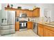 Updated kitchen with stainless steel appliances and granite countertops at 2111 Tetley Ct, Brandon, FL 33510
