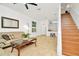 Living room with view of kitchen and staircase at 2111 Tetley Ct, Brandon, FL 33510