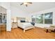 Main bedroom with large bed, walk-in closet and window at 2111 Tetley Ct, Brandon, FL 33510