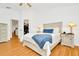 Bright bedroom with wood floors and a large closet at 2111 Tetley Ct, Brandon, FL 33510