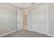 Bedroom includes closet and neutral color palette at 4990 Fairhope Cir, Lakewood Ranch, FL 34211