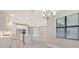 Bright kitchen boasts stainless appliances, an island, and opens to the dining area at 4990 Fairhope Cir, Lakewood Ranch, FL 34211