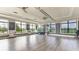 Bright yoga studio with hardwood floors and large windows at 4990 Fairhope Cir, Lakewood Ranch, FL 34211