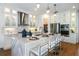 Elegant kitchen with island seating, white cabinets, and stainless steel appliances at 4990 Fairhope Cir, Lakewood Ranch, FL 34211