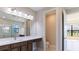 Clean bathroom with a modern vanity, toilet, and neutral tones at 4845 Carova Way, Lakewood Ranch, FL 34211