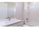 Small bathroom with shower/tub combo and white vanity at 4845 Carova Way, Lakewood Ranch, FL 34211