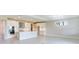 Modern kitchen with island, stainless steel appliances, and white cabinetry at 4845 Carova Way, Lakewood Ranch, FL 34211