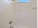 Elegant shower with decorative white tile and modern chrome fixtures at 4910 Carova Way, Lakewood Ranch, FL 34211