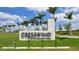 Cresswind Lakewood Ranch community sign with landscaping and palm trees at 4910 Carova Way, Lakewood Ranch, FL 34211