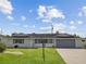 Front view of a newly remodeled house at 716 Fox Hills Dr, Sun City Center, FL 33573