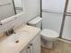 Clean bathroom with a single sink vanity and shower at 716 Fox Hills Dr, Sun City Center, FL 33573
