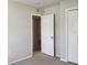 Bedroom with closet and access to hallway at 716 Fox Hills Dr, Sun City Center, FL 33573