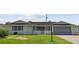 Front view of a ranch-style house at 716 Fox Hills Dr, Sun City Center, FL 33573