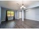 Bright dining room featuring hardwood floors and recessed lighting at 9031 Sienna Moss Ln, Riverview, FL 33578