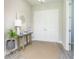 Bright and airy entryway with double doors and wood floors at 291 Mossy River Ct, Brandon, FL 33511